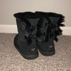Black Ugg boots with bows on the back